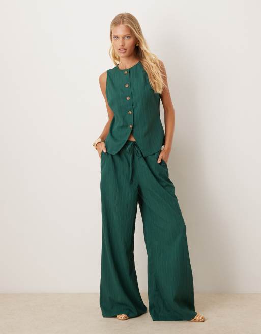 ASOS DESIGN - Pantaloni palazzo verde bottiglia stropicciati in coordinato