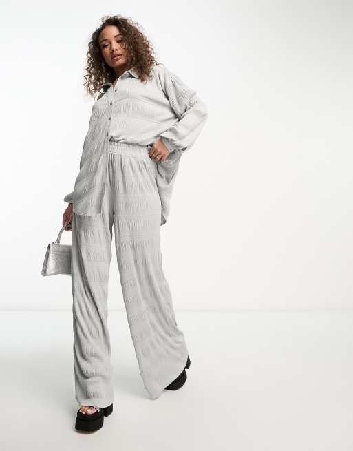 ASOS DESIGN - Pantaloni plissé a fondo ampio color argento in coordinato
