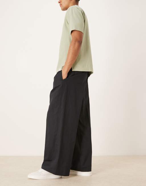 ASOS DESIGN - Pantaloni sartoriali a fondo ampio in misto lino nero a pieghe, 3 di 5