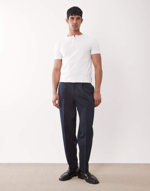 ASOS DESIGN - Pantaloni sartoriali oversize affusolati color blu navy con pieghe
