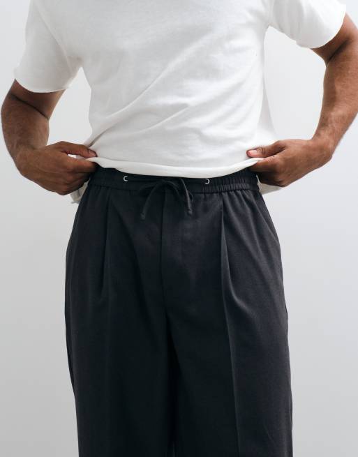 ASOS DESIGN pantaloni sartoriali oversize affusolati in flanella color antracite con vita elasticizzata, 3 di 5