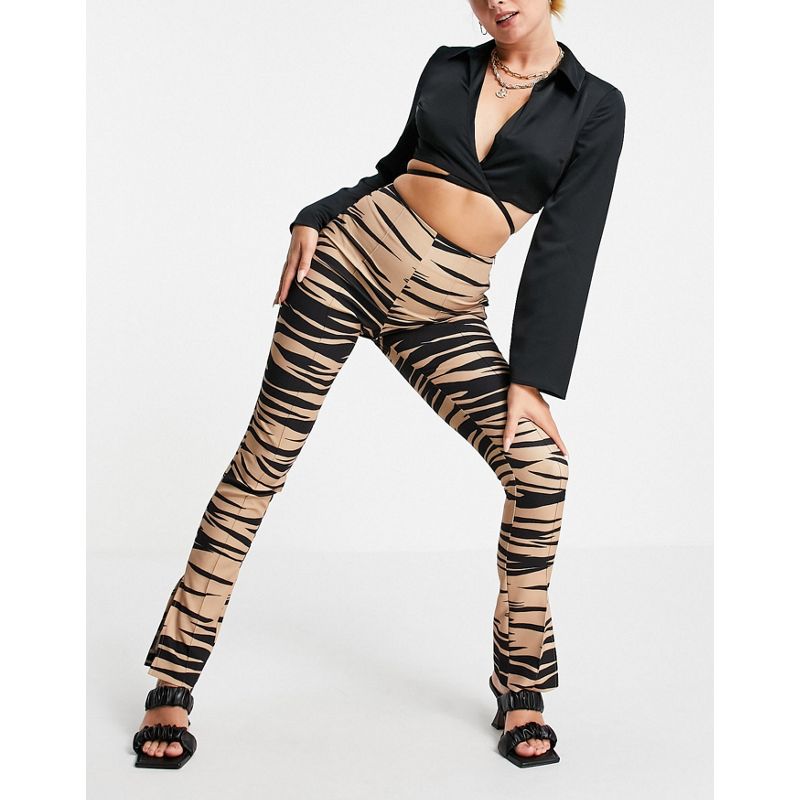 DESIGN - Pantaloni skinny com stampa animalier e spacco sul fondo