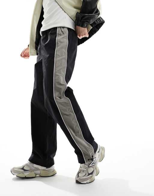 ASOS DESIGN - Pantaloni sportivi ampi in nylon neri con riga laterale grigia , 4 di 5