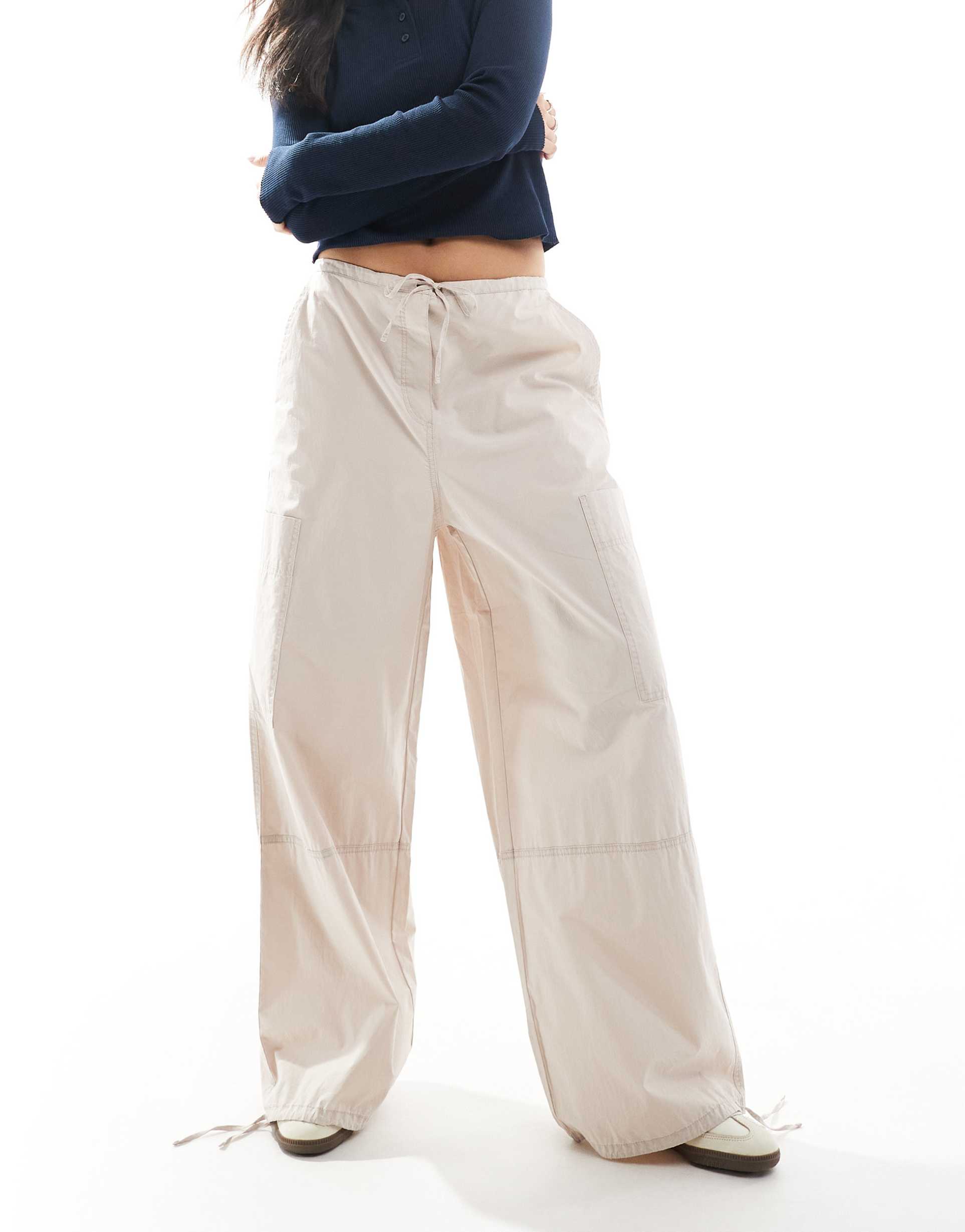 asos design pants with tie hem and clean utility pocket in stone