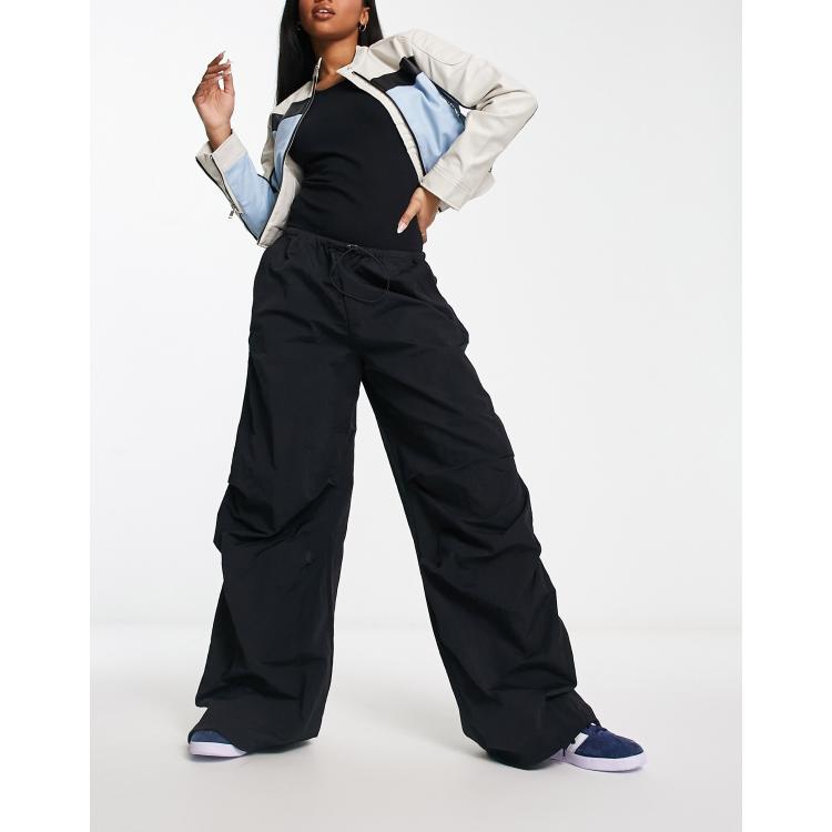 ASOS DESIGN parachute cargo pants in black leather look