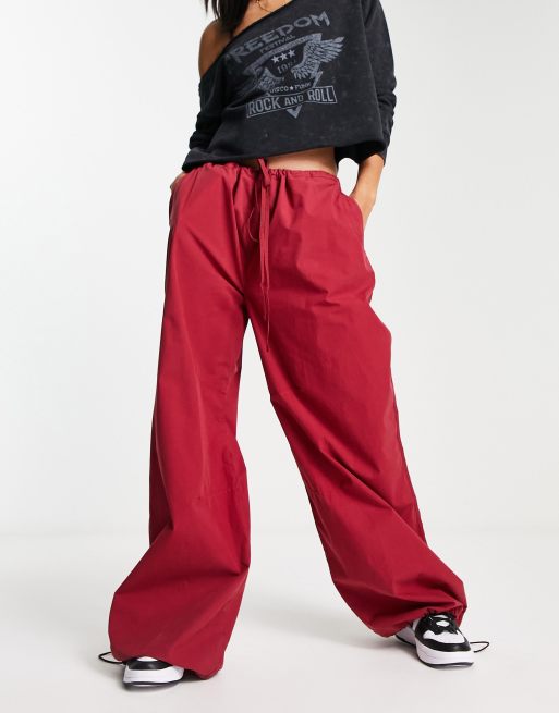 ASOS DESIGN parachute cargo pants in burgundy