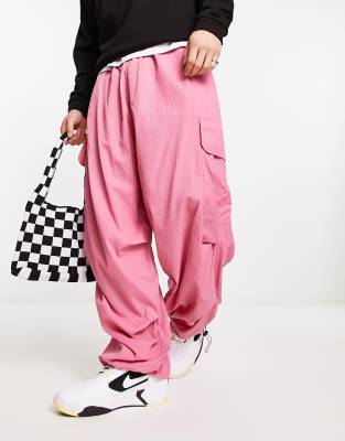 ASOS DESIGN parachute cargo pants in pink | ASOS