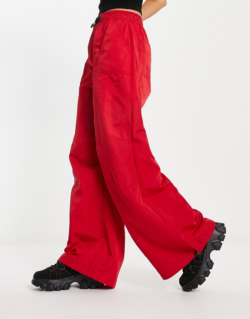 ASOS DESIGN parachute cargo trouser with belt detail in techy fabric in red