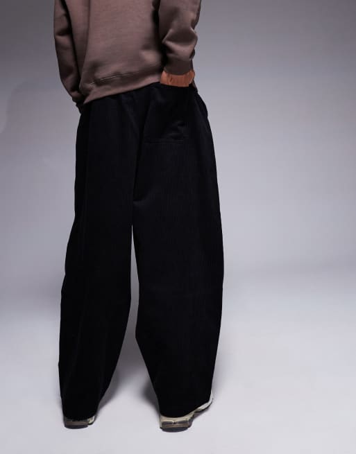 ASOS DESIGN parachute corduroy pants in black