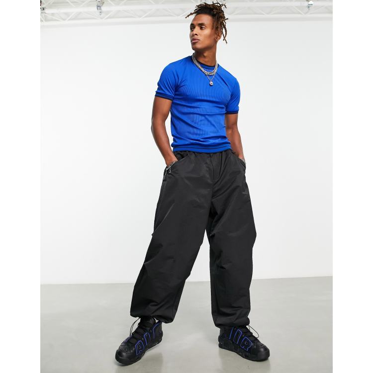 ASOS DESIGN parachute cargo pants in orange