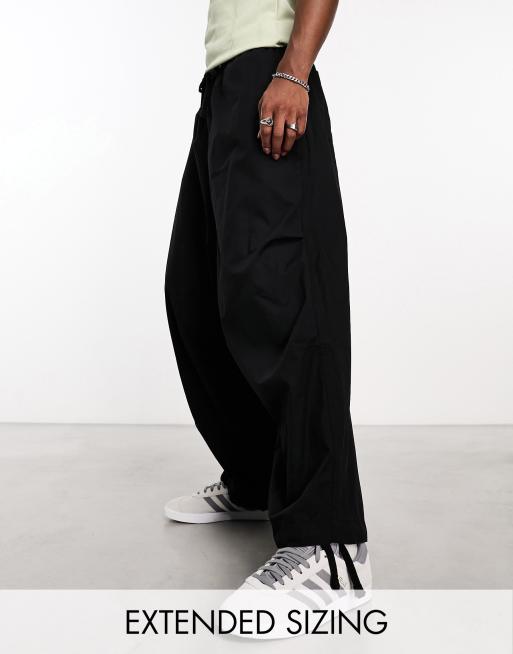 Wide-leg black parachute trousers