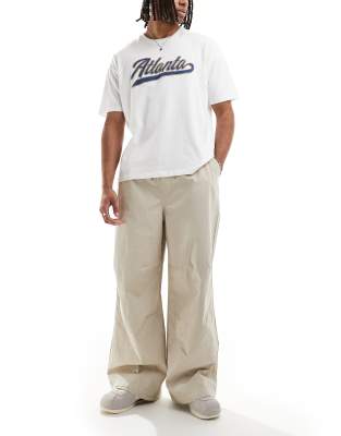 ASOS DESIGN parachute pants in stone poplin - view 1