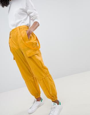 yellow parachute pants