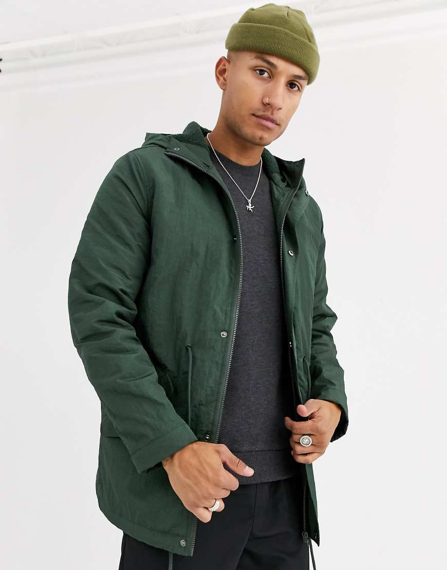 ASOS DESIGN parka jacket in bottle green with fleece ASOS DESIGN parka jacket in bottle green with fleece