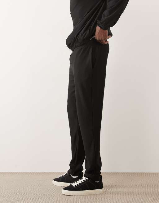 ASOS DESIGN - Parte de un conjunto - Joggers negros de corte slim de canalé, 4 de 5