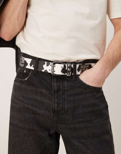 ASOS DESIGN – Pasek z imitacji skóry z ćwiekami i wzorem w krowie łaty