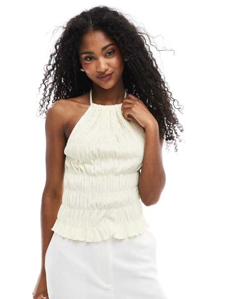 ASOS DESIGN texture shirred halter top in buttermilk