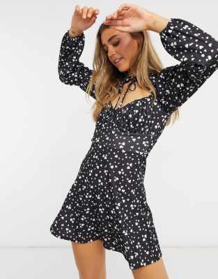 Buy Asos Design women petite peekaboo long sleeve flippy mini dress black  combo Online