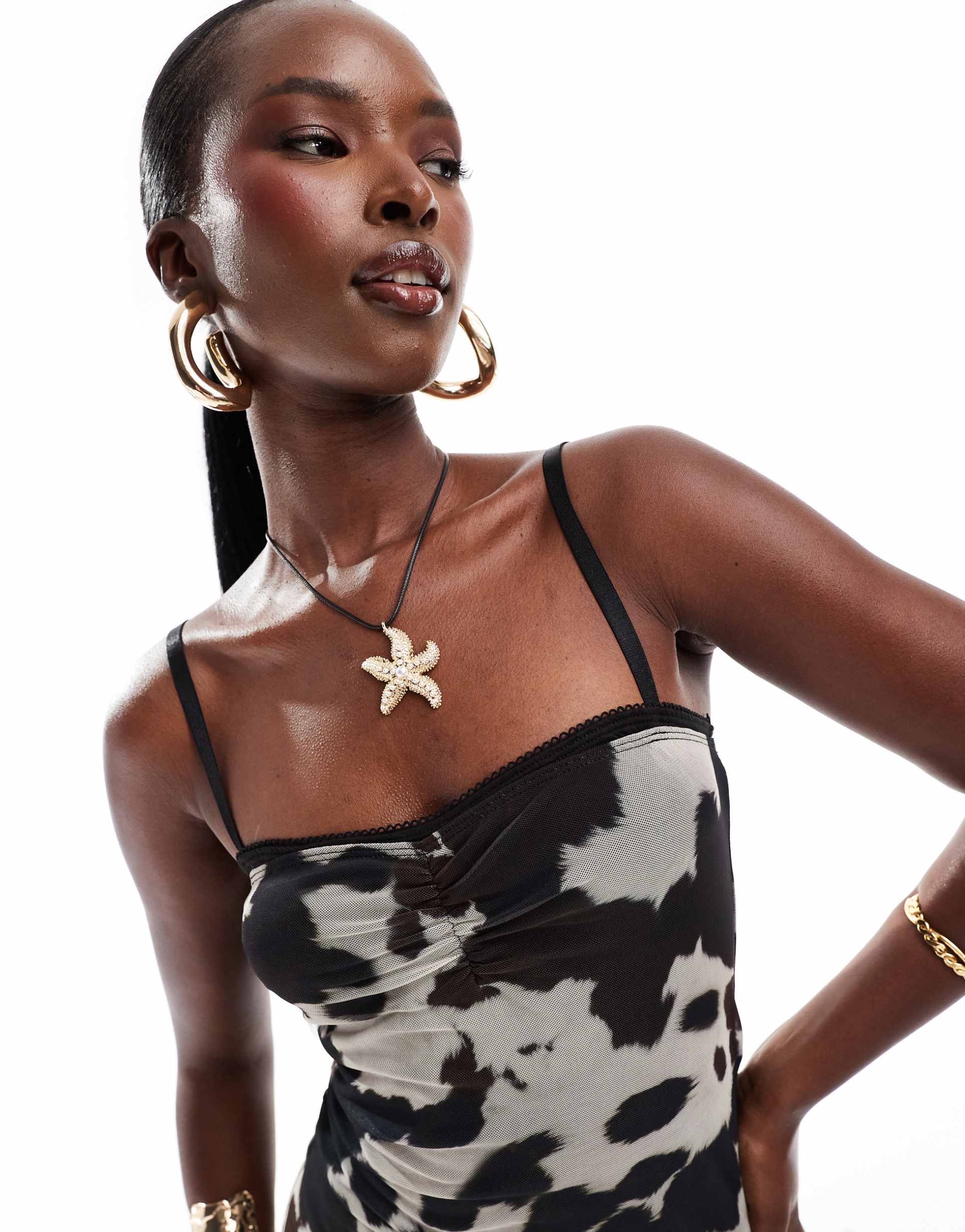 asos design peekaboo mesh midaxi dress in cow print