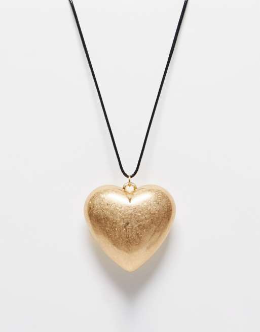 Big gold deals heart pendant