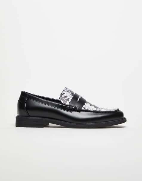 ASOS DESIGN – Penny-Loafer in Schwarz mit floralem Vorderblatt - view 1
