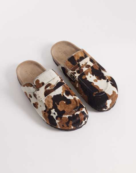 ASOS DESIGN – Penny-Loafer-Pantoletten mit Kuhfellmuster - view 1