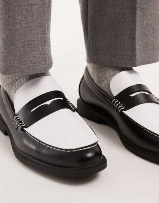 ASOS DESIGN penny loafers in black and white