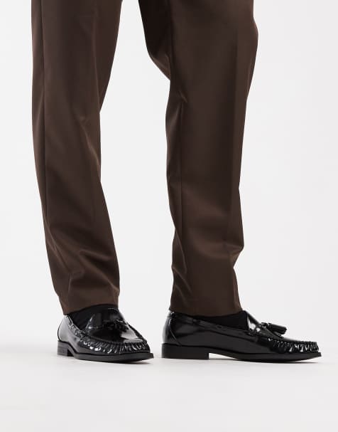 ASOS DESIGN penny loafers in black with tassel - view 1