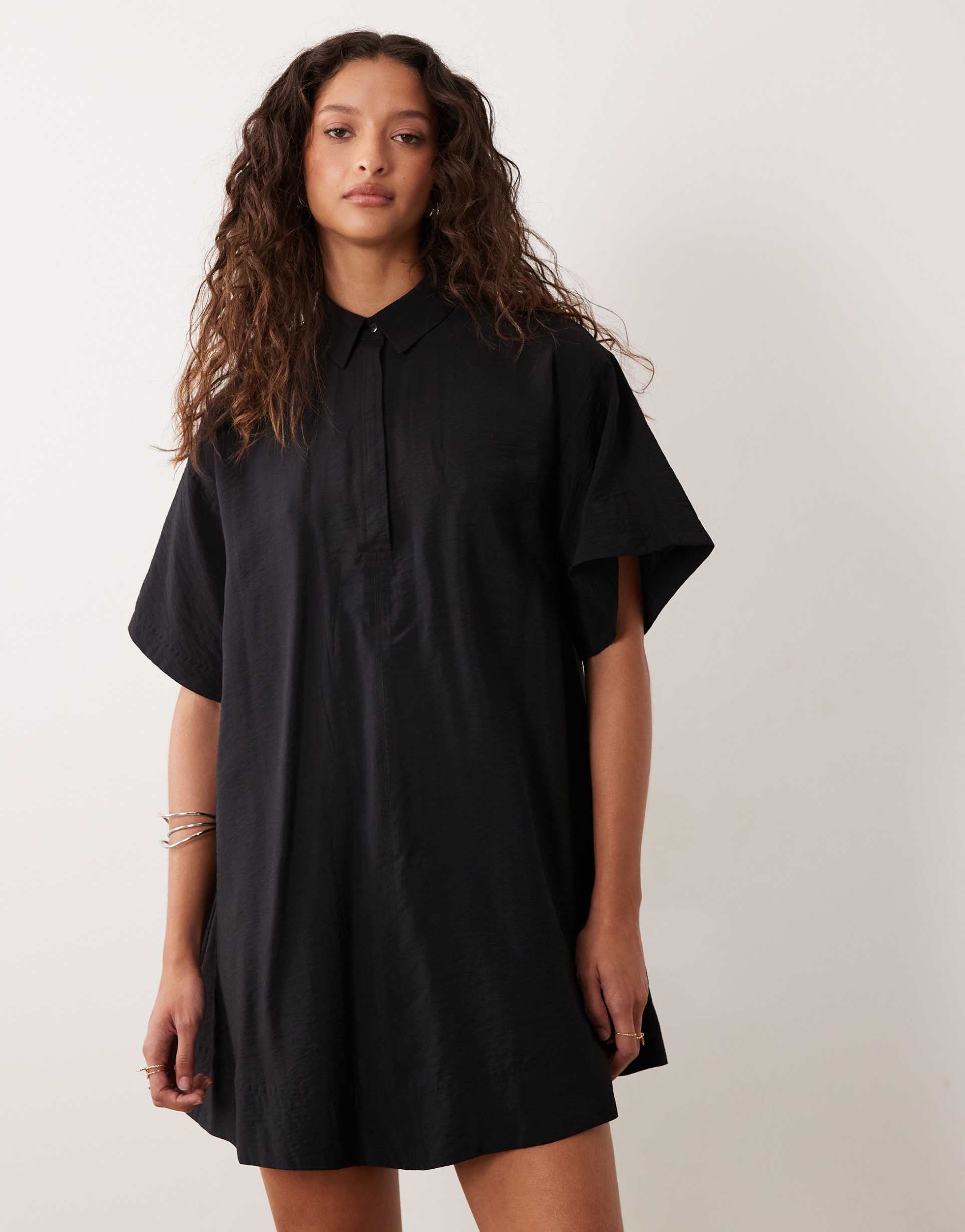 asos design performance fabric relaxed short sleeve mini dress in black