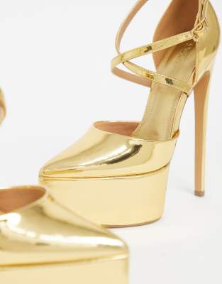 gold stiletto pumps