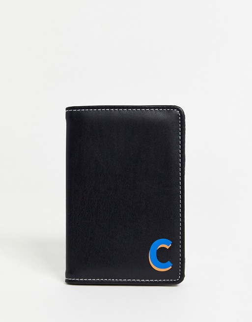 ASOS DESIGN personalised faux leather passport cover in black with 'C' initial