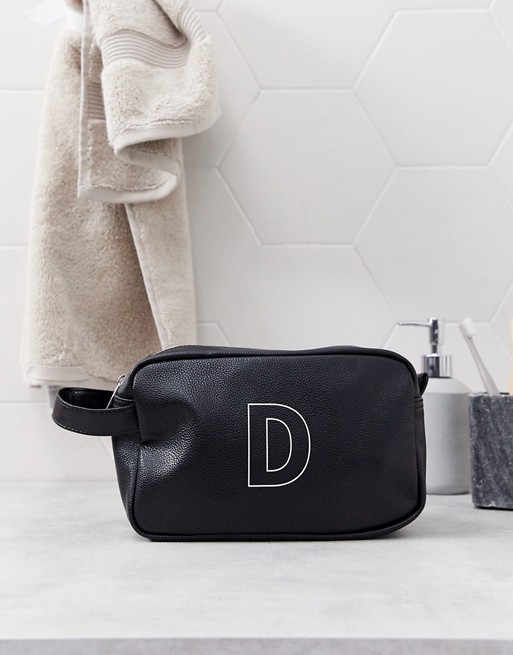 ASOS DESIGN personalised faux leather wash bag in black with 'D' initial