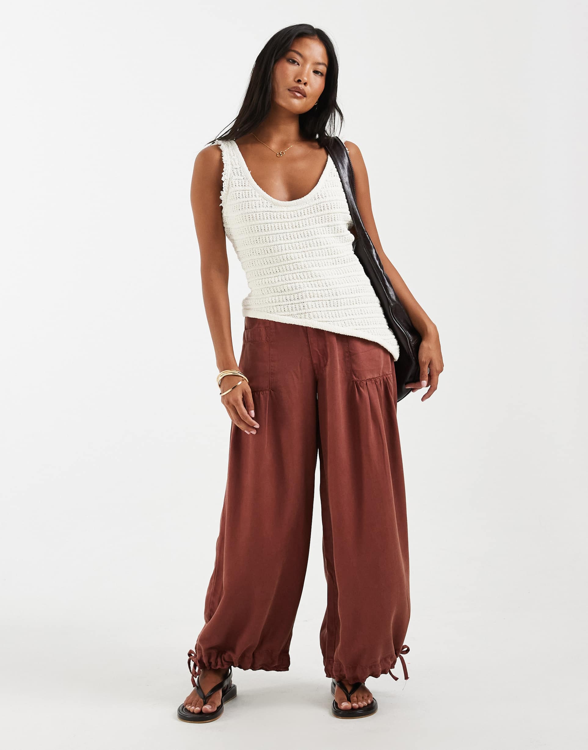 asos design petite balloon pants with front pockets and adjustable tie hem in rust