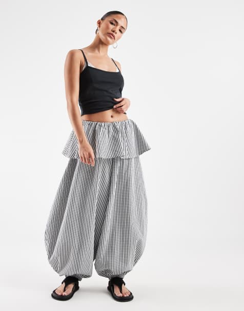 ASOS DESIGN Petite balloon trousers with skirt overlay detail in black & white check - view 1