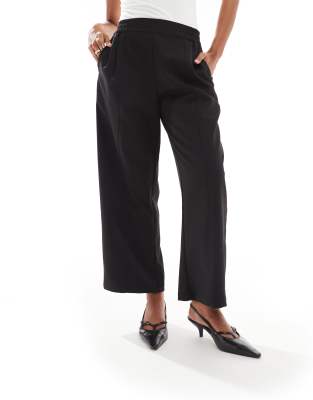 ASOS DESIGN Petite barrel leg pull on tailored trouser in black