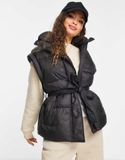 ASOS DESIGN Petite faux leather puffer gilet in black