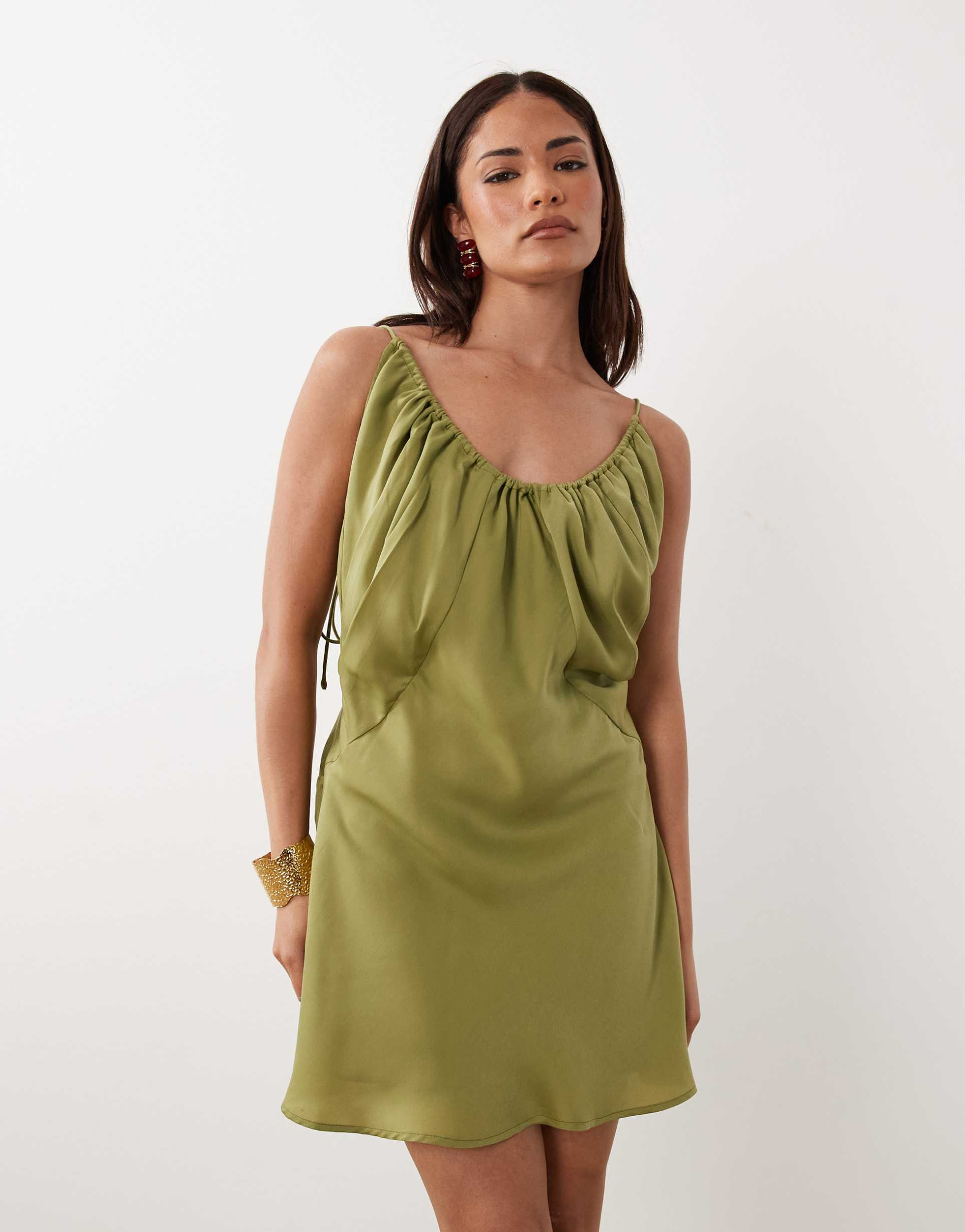 asos design petite bias cut scoop neck low back satin mini dress in olive green