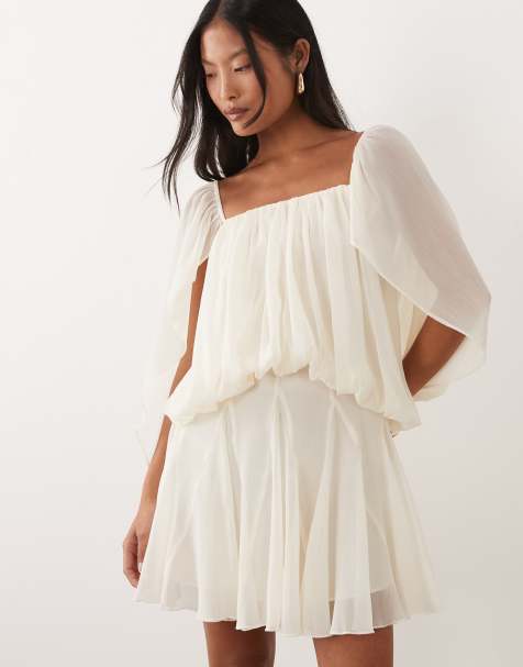 ASOS DESIGN Petite blouson mini dress with split sleeve and volume godet skirt in cream - view 1