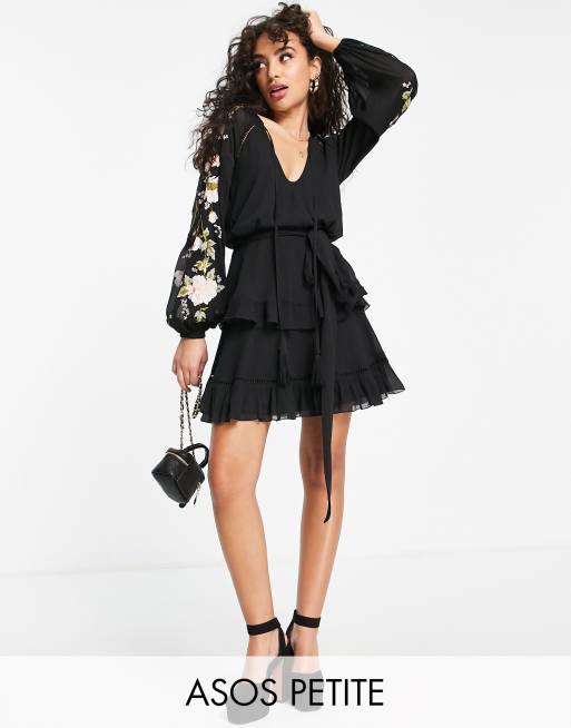 ASOS DESIGN Petite blouson sleeve tiered mini dress with cross stitch embroidery detail and tie in black