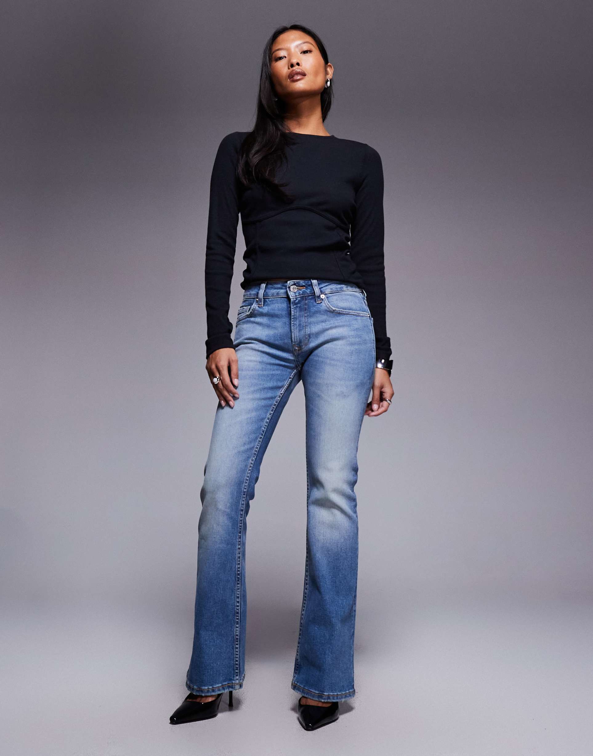 asos design petite bootcut jeans in midwash