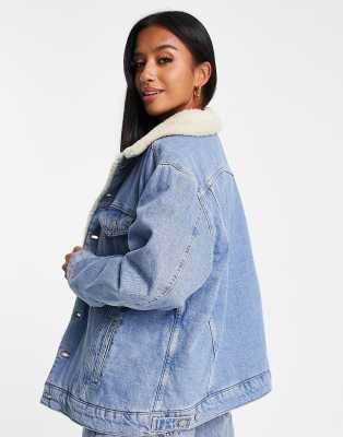 ASOS DESIGN Petite borg denim jacket in washed blue, 1 of 4