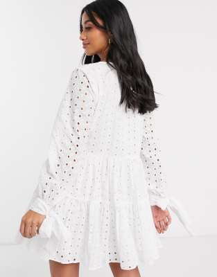 asos design tiered trapeze mini dress in broderie