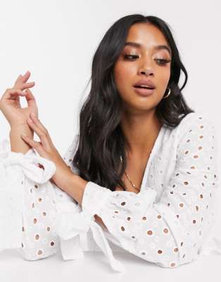 asos design tiered trapeze mini dress in broderie