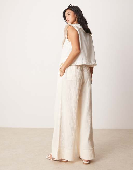 ASOS DESIGN Petite - Broek van kaasdoek met elastische taille en onafgewerkte rand in lichtgeel, 3 van 5