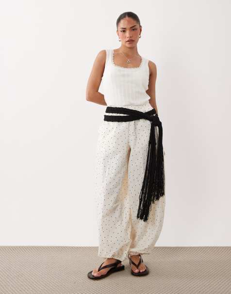 ASOS DESIGN Petite byxor i bomulls- och nylonmix med resårmidja och ballongben med prickigt mönster - view 1