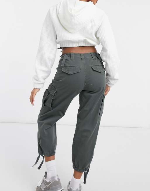 ASOS DESIGN Petite cargo pants with utility pocket in khaki