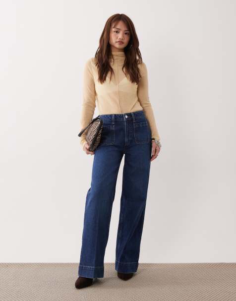 ASOS DESIGN Petite – Ciemnoniebieskie jeansy z szerokimi nogawkami, podwyższonym stanem i kieszeniami z przodu - view 1