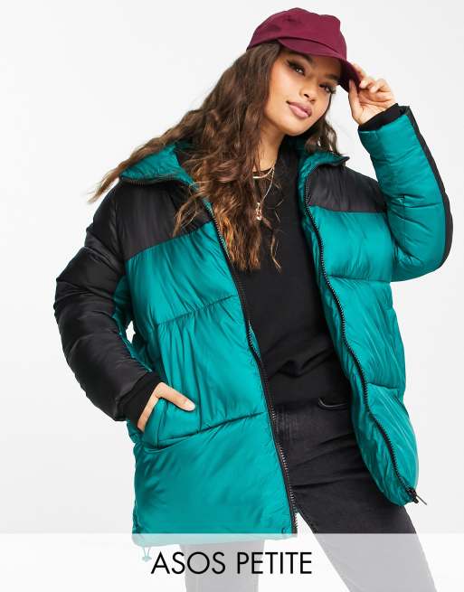 Green and store black puffer jacket