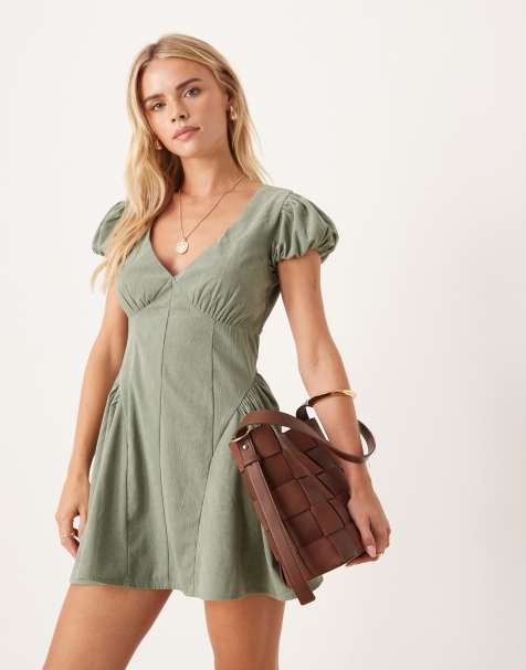 ASOS DESIGN Petite cord corset waist mini dress with puff sleeve in washed olive - view 1