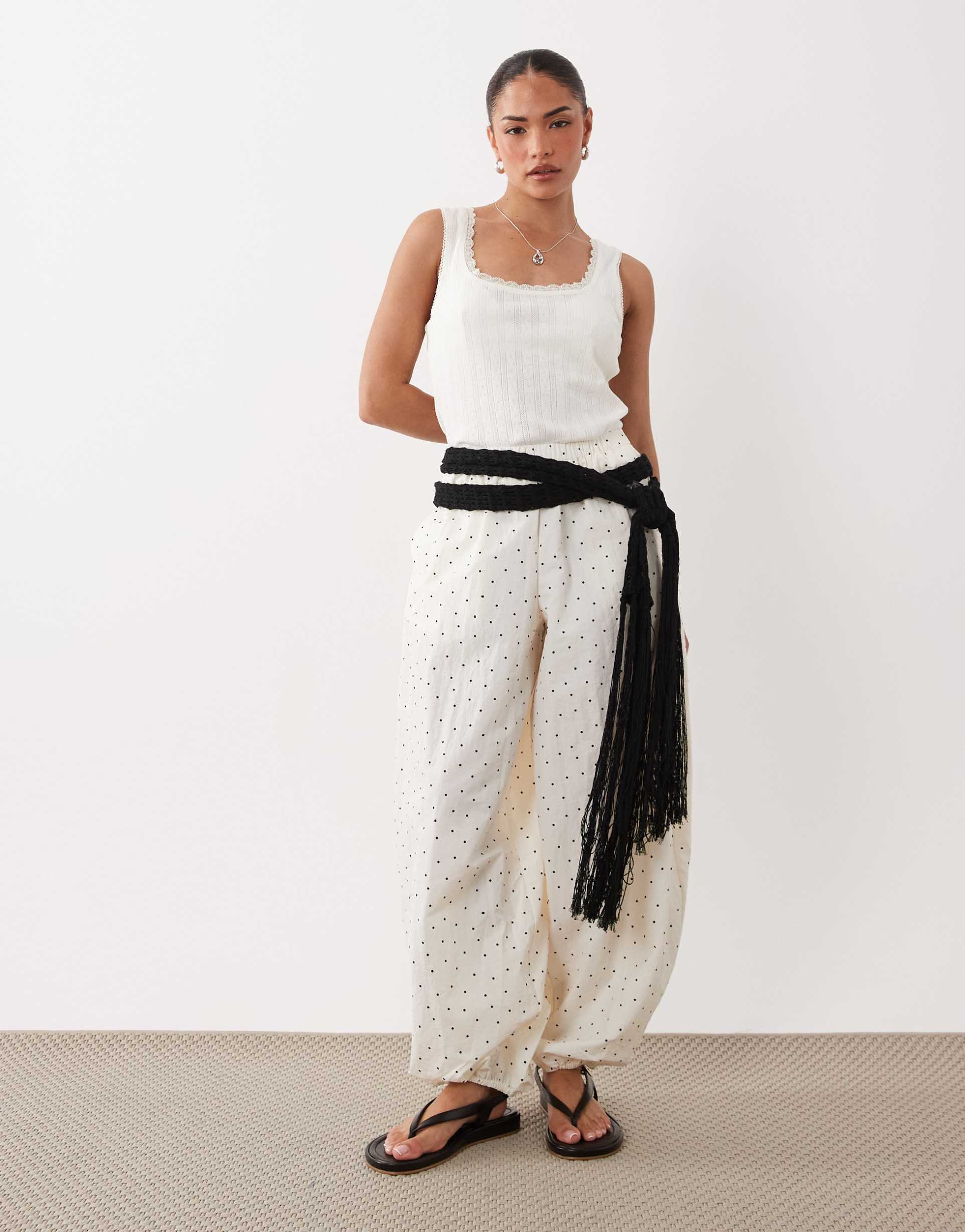 asos design petite cotton nylon blend pull on balloon pants in polka dot